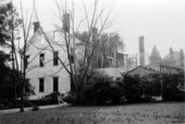 View showing fire damage to the B.C. Lewis house at 316 E. Park Ave. in Tallahassee, Florida.