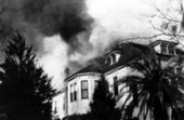 View showing fire at the B.C. Lewis house located at 316 E. Park Ave. in Tallahassee, Florida.
