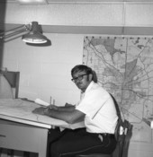 TFD firefighter Ernie Cox working on street maps of Tallahassee.