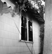 View showing fire damage to the Tom Hadley house located at 613 N. Copeland St. in Tallahassee, Florida.