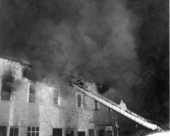 TFD firefighters extinguishing fire at the building on the corner of Macomb and Madison streets in Tallahassee, Florida.