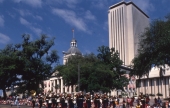 U.S. Marines in parade on Monroe St. in front of the Capitol.