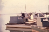 Close-up view of oyster boats docked at St. George Island.