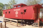 Close-up view of a Seaboard Railroad caboose at the Tallahassee Museum of History and Natural Science.