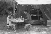 Campers picnicking at their T. H. Stone Memorial St. Joseph Peninsula State Park campsite.