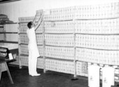 John P. Altemus stacks boxes in Baby Valet Laundry - Daytona Beach, Florida .