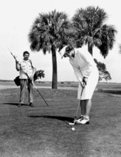 Babe Zaharias and her caddy at the golf tournament - Saint Augustine, Florida