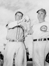 "Red" Lucas of the Chicago Cubs shows Ed Murphy some pitching tricks - Saint Augustine, Florida