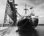 Ship being loaded with phosphate - Port Tampa, Florida.