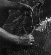 Getting shrimp net ready - Apalachicola, Florida