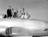 Commission members stand by Air Force Jet Plane, P-80 - Eglin Air Force Base, Florida