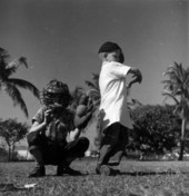 Herman Smith and Wayne Reese at bat - Miami, Florida