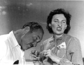 Elnora Metzel and husband Truman T. Metzel smelling a shell - Sanibel Island, Florida.