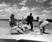 Annabelle Lee and Thelma Eisen rush for the plate - Opa-locka, Florida