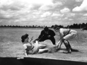 Marg Callaghan slides into plate - Opa-locka, Florida