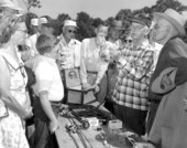 Unidentified man demonstrates fishing equipment - Saint Petersburg, Florida .