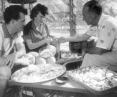 Honeymooners, Jim and Lyn and unidentified man with shells - Sanibel Island, Florida .