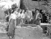 International teachers around the well at the oldest school house - Saint Augustine, Florida .
