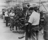 View showing employees working in machine shop at the Soroban Engineering production facility - Palm Bay, Florida