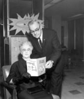 Mr. and Mrs. Floyd Davis look at a pamphlet