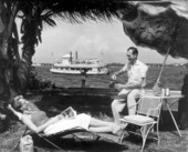 Unidentified couple near the waterway .