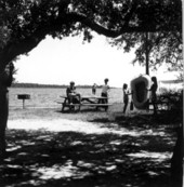 Visitors near the water at a camp site - Fort Pickens, Florida