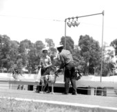 Unidentified men with a racing dog - Miami Shores, Florida .
