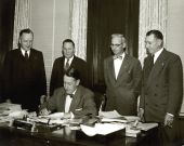 Governor Charley E. Johns signing an Elks proclamation in Tallahassee, Florida.