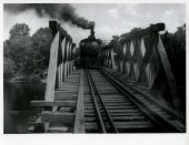 Live Oak, Perry & Gulf Railroad train crossing the Suwannee River at Dowling Park, Florida.