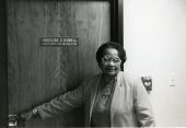 Portrait of Leon County Assistant Superintendent for Instruction Aquilina Casanas Howell at her office door.