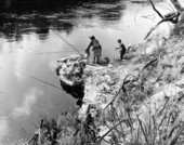Young boy and girl with woman fishing - Suwannee County, Florida