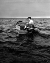 Columbus White, commercial fisherman on his boat - Alachua County, Florida