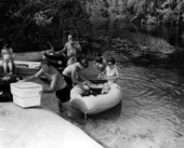 Visitors unload their supplies from the float at the spring - Columbia County, Florida