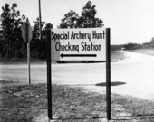 Sign to a checking station