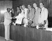 Florida's 37th Governor Reubin Askew presenting a cabinet resolution to Reverend C.K. Steele - Tallahassee, Florida.