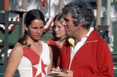 Composer Burt Bacharach signing autograph for a ball girl at Dinah Shore tennis tournament - Fort Lauderdale, Florida