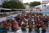 Group portrait of the Pine Crest School swim team in the water - Fort Lauderdale, Florida
