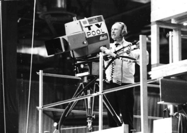 Television camera man on a scaffold - Miami Beach, Florida