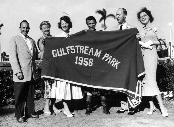 Presenting the Times Handicap winner with a blanket